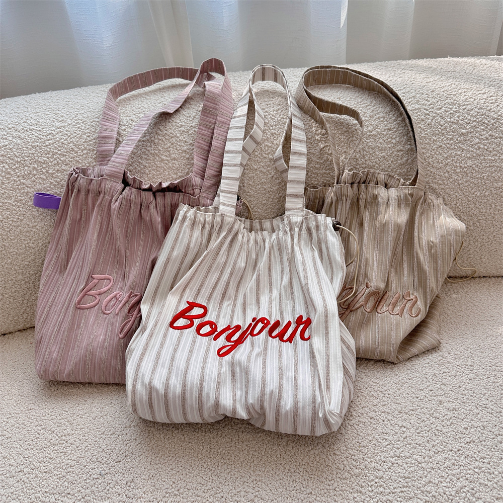 4922 Korean-style ins striped letter-embroidered single-shoulder tote bag, drawstring large-capacity canvas bag, commuter shopping bag full figure
