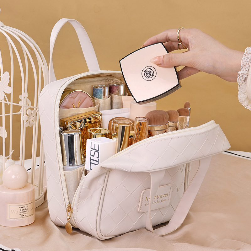 New large-capacity woven makeup bag, high appearance level portable travel PU hand-held zoned makeup lipstick storage bag details Picture