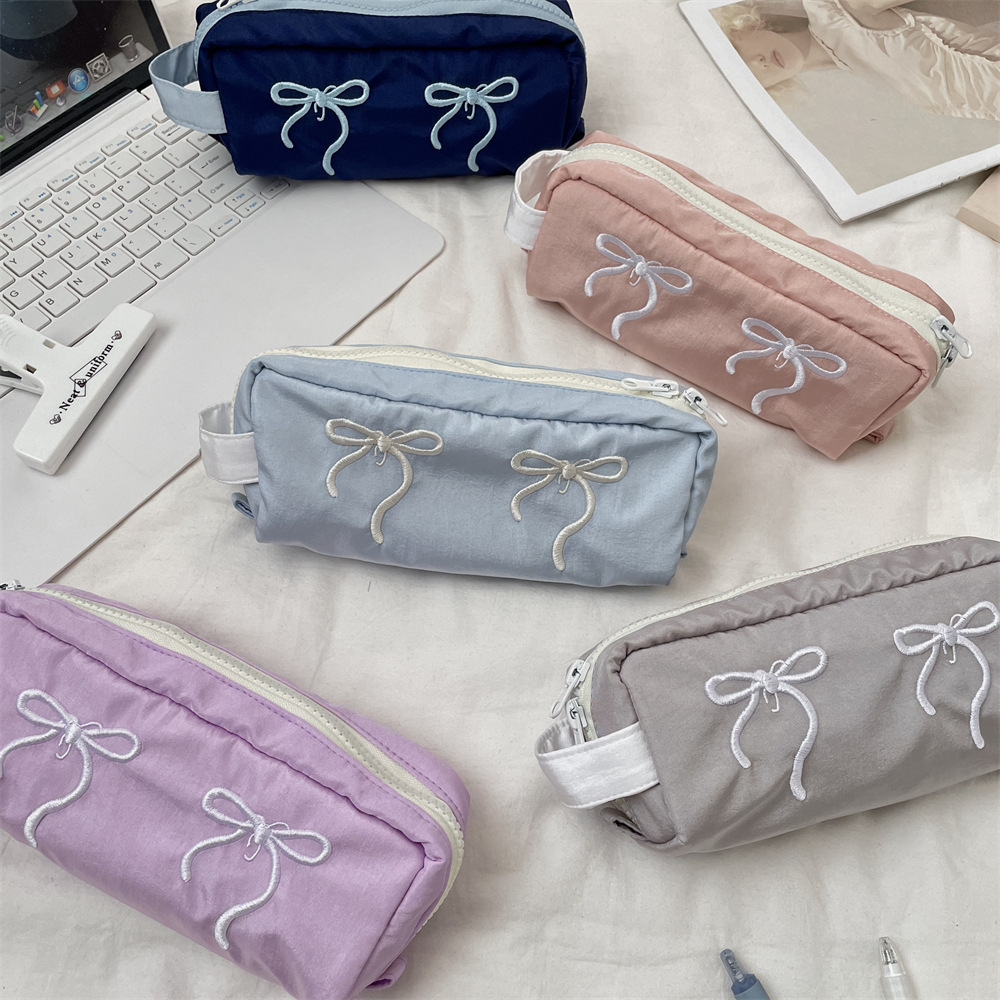 54202 Korean-style bow embroidery pen case, large-capacity, multi-functional, high-appearance-level stationery pencil box for male and female students details Picture