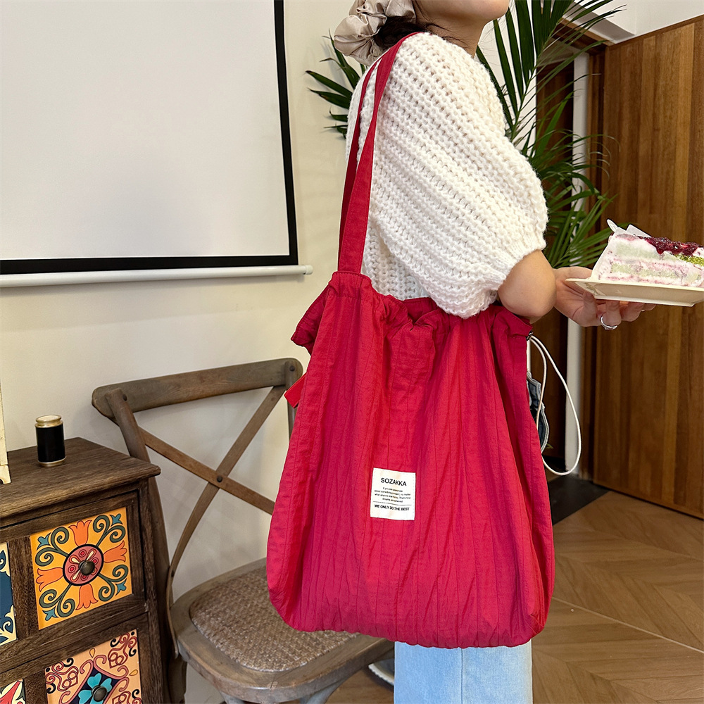New 4941 striped drawstring single-shoulder bag, laid-back style tote fabric bag, large capacity commuter bag, student class bag details Picture