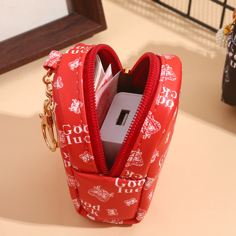 This mini and high-end coin purse for women is compact and convenient. It can carry Chinese-style headphones and keys with you. The small bag can be hung Specification drawing