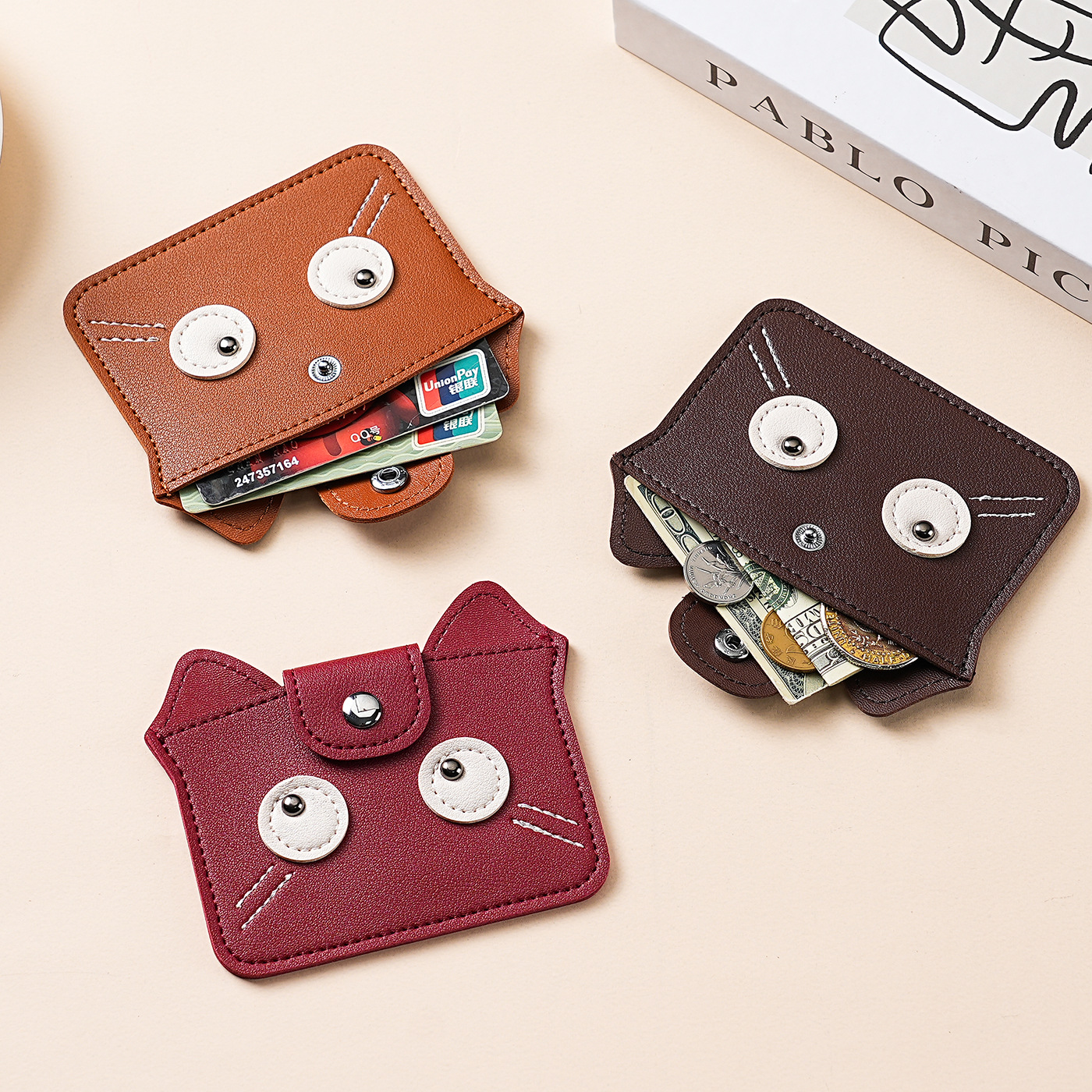 The 2025 new minimalist women's genuine leather neck-neck coin purse, with a high-end feel and a cute cartoon mini card case, is a trendy storage bag details Picture