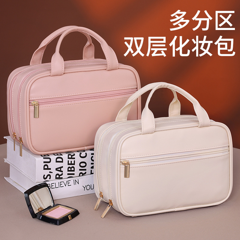 French double-layer hand-held makeup bag, large capacity, high-end makeup brush storage bag, travel portable, partitioned toiletries bag full figure