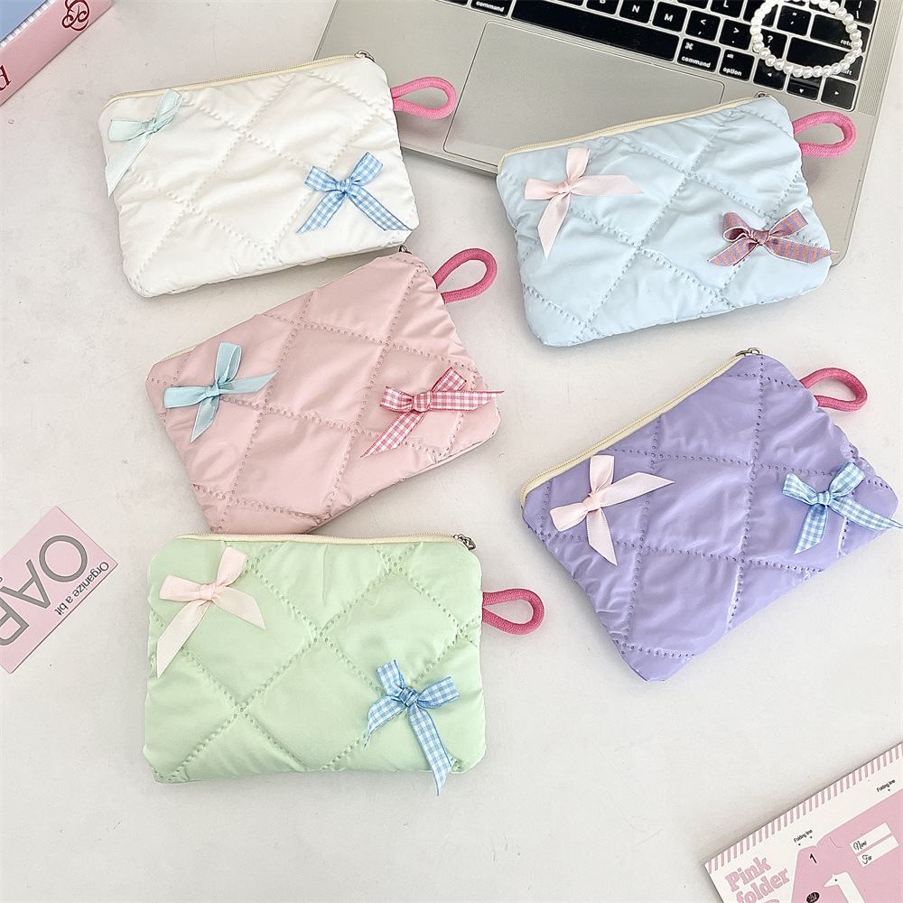 411293 New pearlescent glossy bow portable lipstick, makeup bag, toiletry bag, miscellaneous storage and coin purse full figure