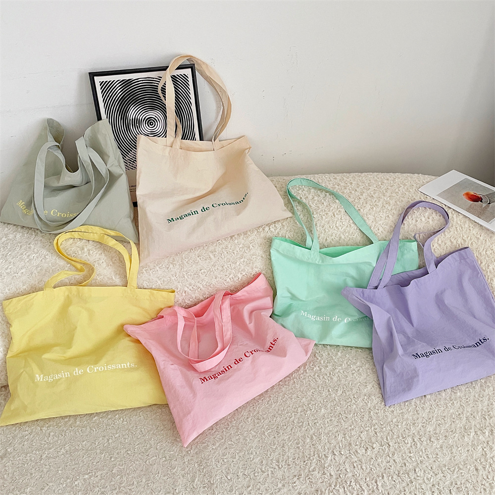 56181 large-capacity canvas tote bag for girls, single-shoulder bag for students' classes, printed fabric bag, simple schoolbag details Picture