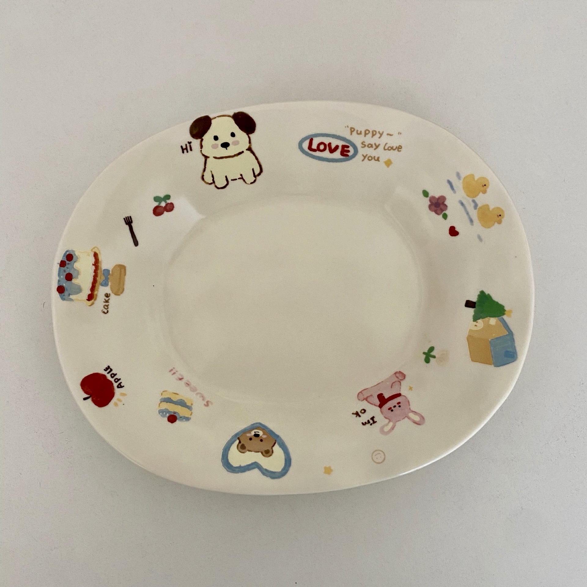 Ceramic graffiti series oval plate, cute cartoon animal kitchen fruit and vegetable plate, breakfast light food dessert photo plate Application Scenario
