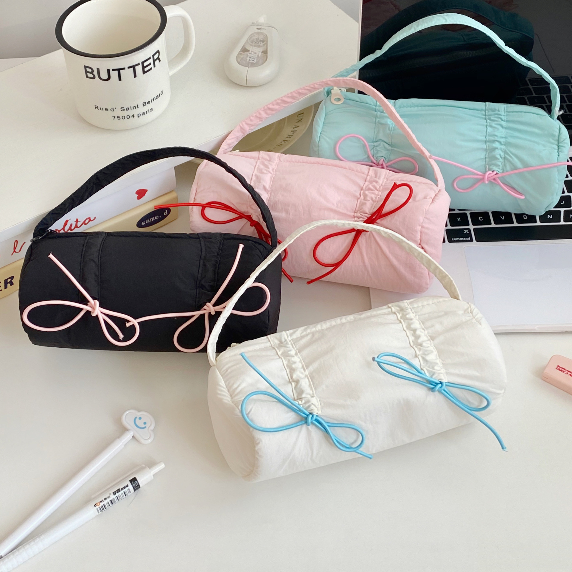 Candy-colored bow pen case, Korean-style high appearance level, large-capacity stationery storage bag for junior and senior high school students, hand-held stationery bag for girls full figure