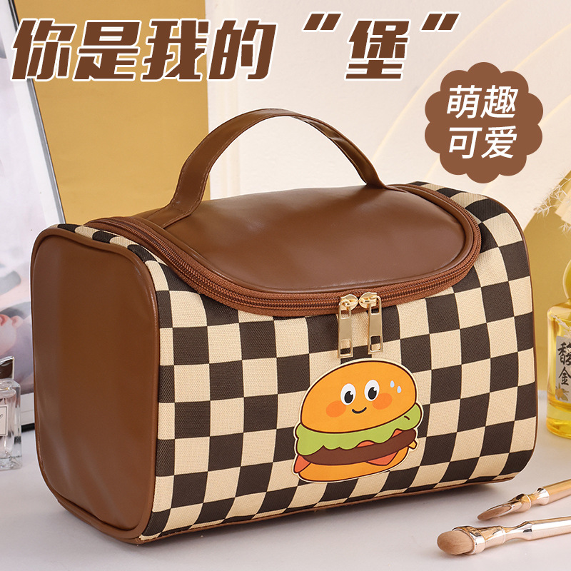 A large-capacity women's makeup bag with a checkerboard pattern, portable and high appearance level, a new travel cosmetics toiletry bag and storage bag full figure