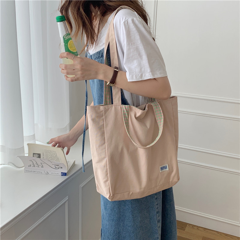 Wholesale of 12254 Japanese and Korean style double-bread simple checkered single-shoulder bag for student girls and casual dual-purpose canvas bag Application Scenario