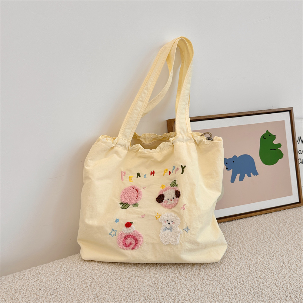 4931 ins Cute Puppy embroidered single-shoulder bag, large capacity casual and versatile, portable drawstring large capacity tote bag Application Scenario