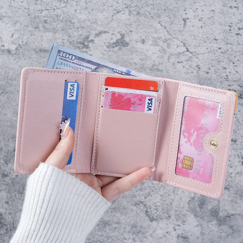 The new wallet is a cute and compact three-fold short coin purse with multiple functions. It is a mini card holder with multiple slots for women Specification drawing