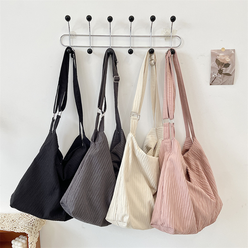 53182 Korean niche canvas bag for women, 2025 New large-capacity commuter crossbody bag, adjustable single-shoulder bag full figure