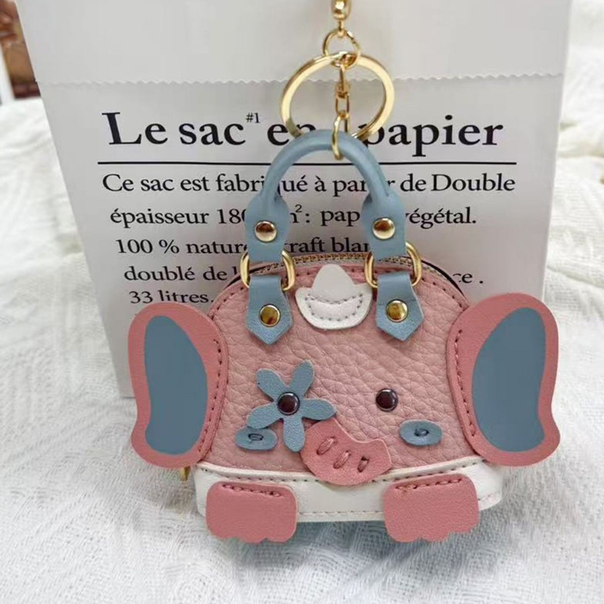 Mini pink elephant bag, the same style as Xiaohongshu puppy and elephant earphone case, mini coin purse, red envelope for women details Picture