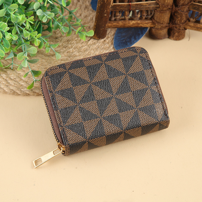 A short Korean version of a lady's wallet with old PU patterns, multiple slots, charming and small zipper wallet LOGO full figure