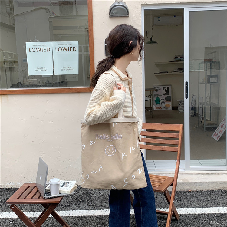 【 In Stock 】110182 Korean canvas bag, women's embroidered hello letter printed single-shoulder bag, simple and large capacity Application Scenario