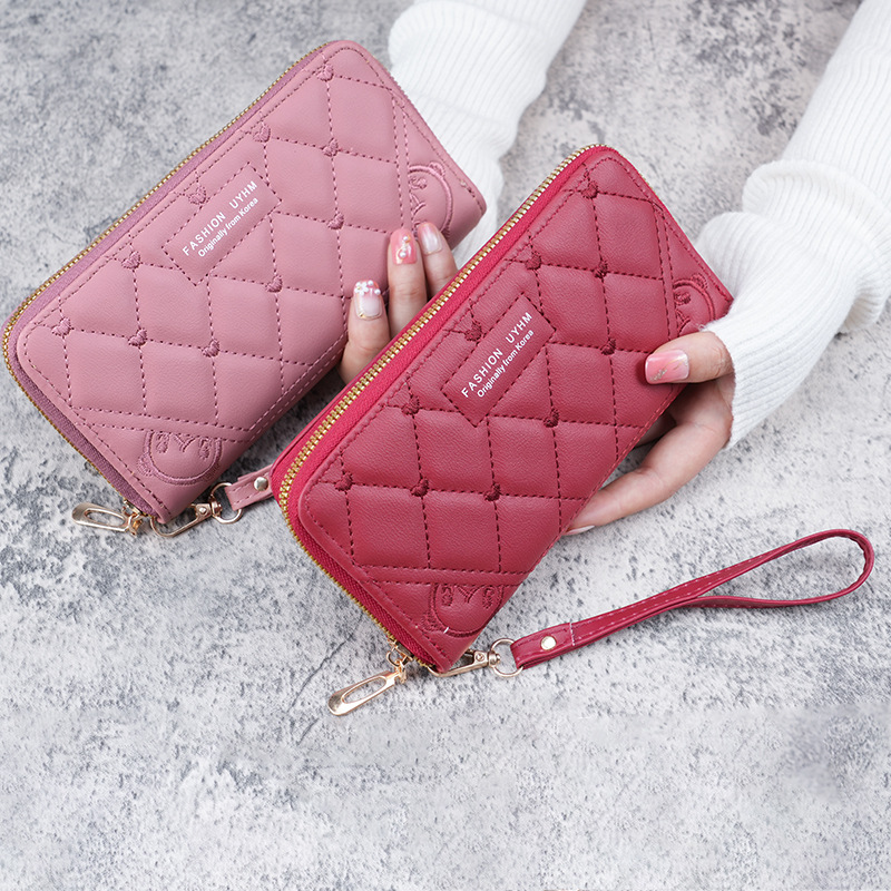 A fresh and sweet mid-length women's wallet in stock for the 2023 summer. It's a solid-color PU leather embroidered wallet Specification drawing