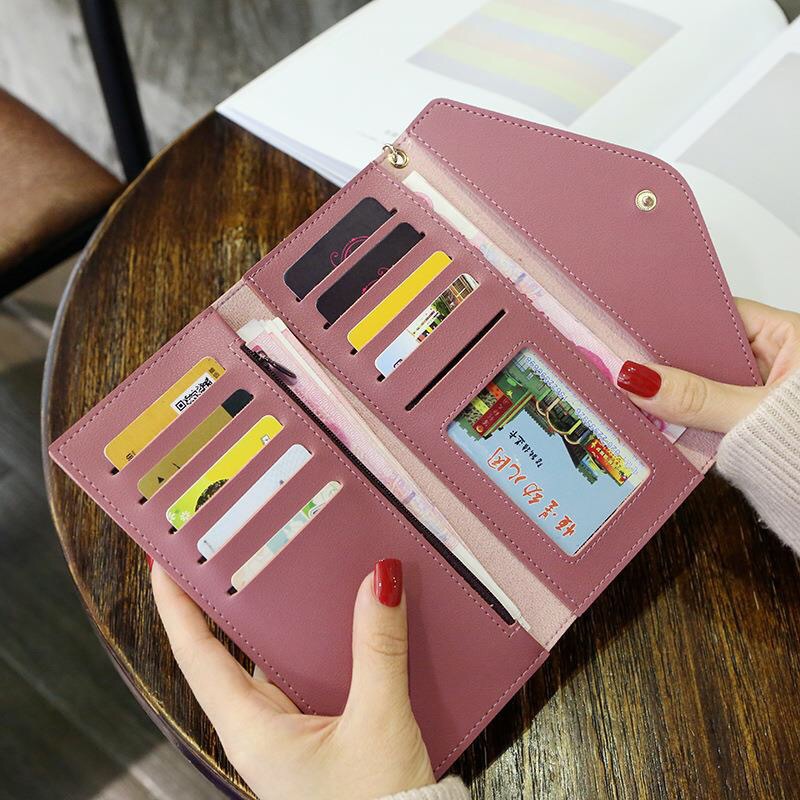 2019 Spring/Summer new long hand-held trendy heart-shaped pendant, simple, fashionable and multi-functional women's wallet with lychee pattern details Picture