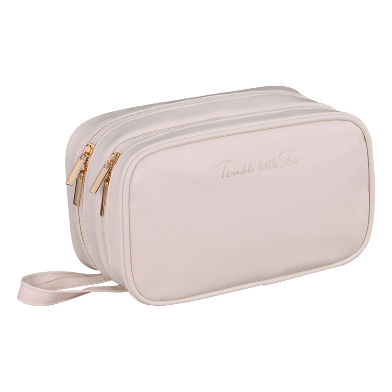 The new cross-border double-layer Starlight Beauty pu makeup bag features a large capacity and a high-end feel. It is a portable hand-held makeup brush storage bag Item Picture