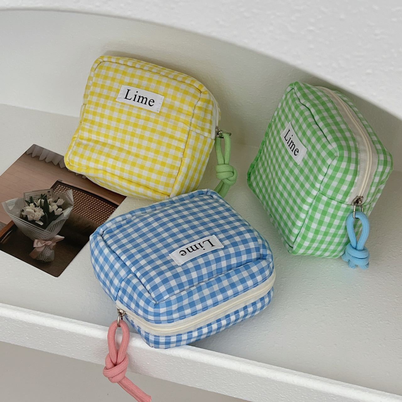 A Japanese-style cotton fabric blue checkered small square bag with an ins style and high appearance level. It is a portable, cute and multi-functional storage bag for students details Picture