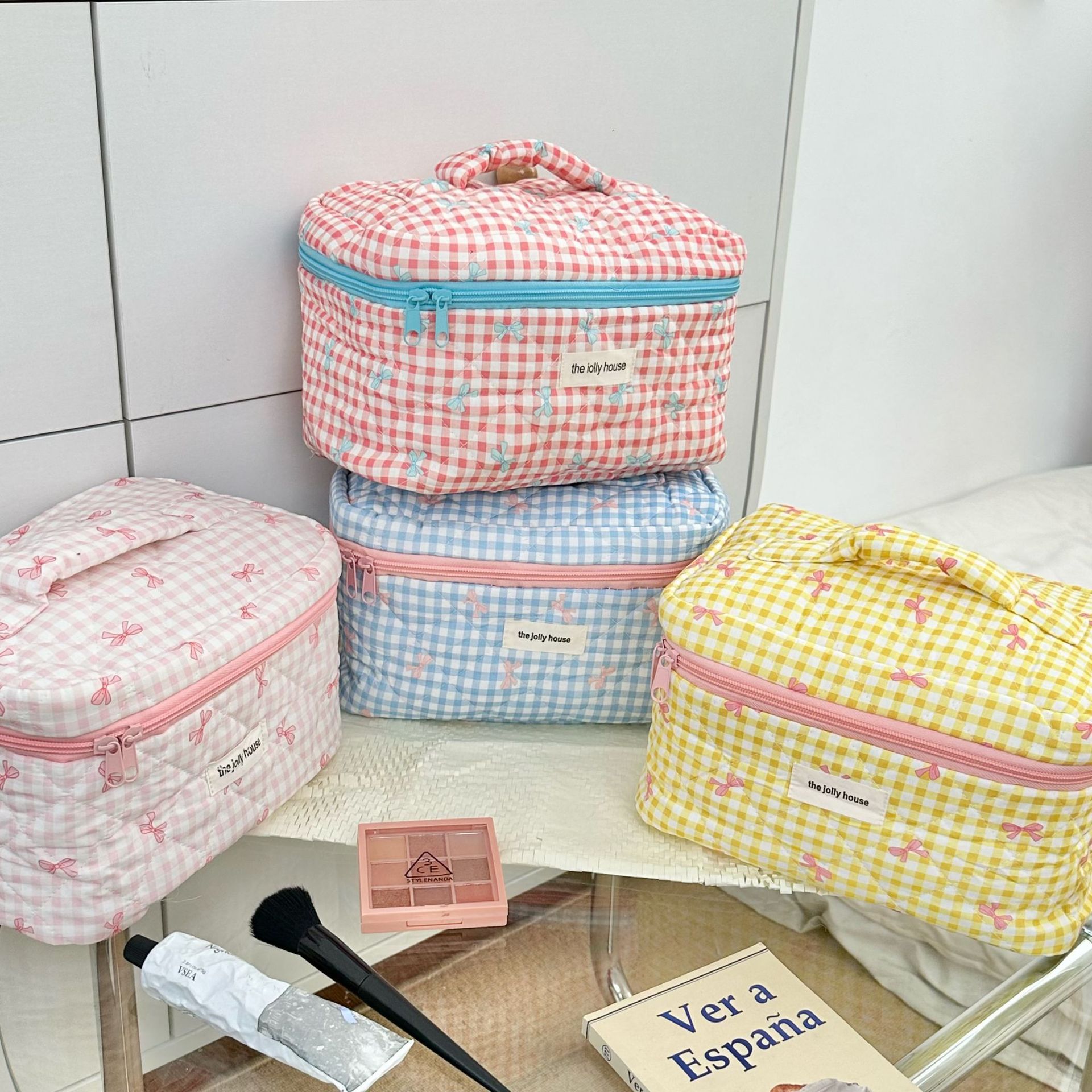 ins Korean version cream-style makeup bag, high appearance level bow, toiletries and skin care products storage bag, handbag details Picture