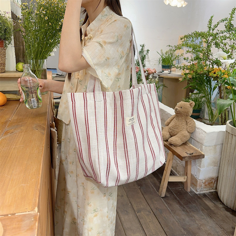 44202 Korean version large-capacity fashionable color-blocking striped tote bag, spring and summer striped casual bag, single-shoulder canvas bag details Picture
