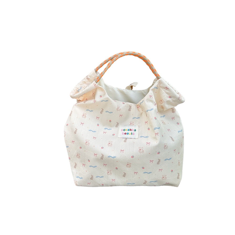 44181 Korean embossed cartoon canvas bag for women, large-capacity hand-carry bag for shopping, work and commuting Item Picture