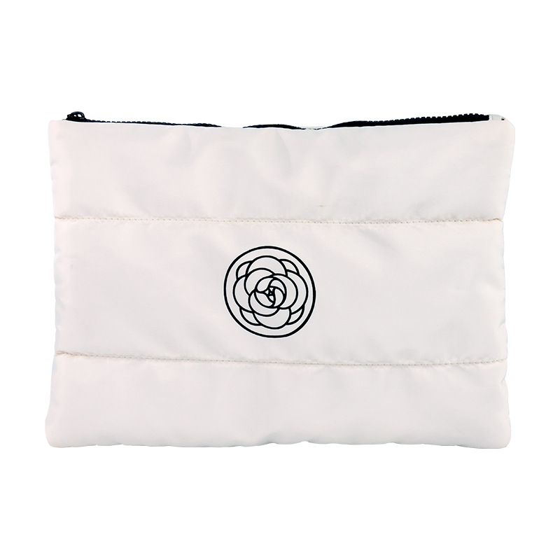 Xiaoxiangfeng Camellia large-capacity down cotton fashionable hand-held makeup bag, portable toiletry bag, high-end storage bag Item Picture
