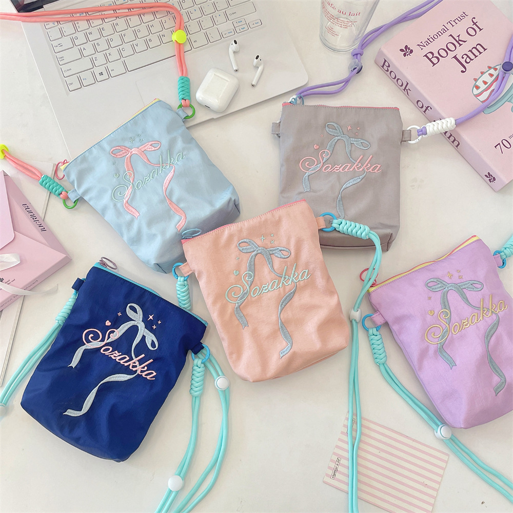 56251 Embroidered bow single-shoulder bag for Women 2025 New trendy, fashionable, lightweight commuting canvas single-shoulder crossbody bag details Picture