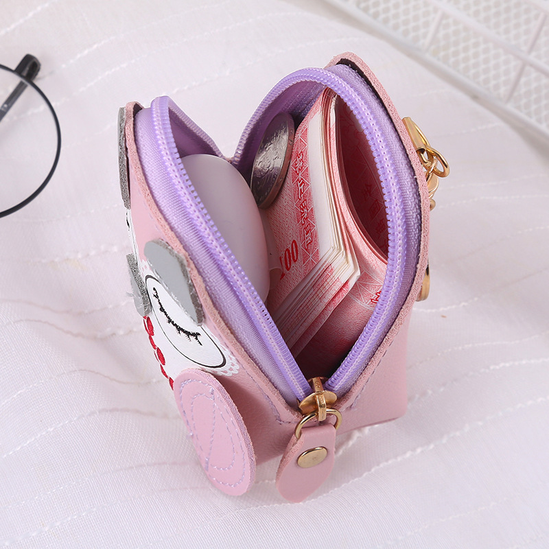This cute mini coin purse with an ins style for women exudes a sense of luxury. It can be hung around with headphones and a pendant for storing small change Specification drawing