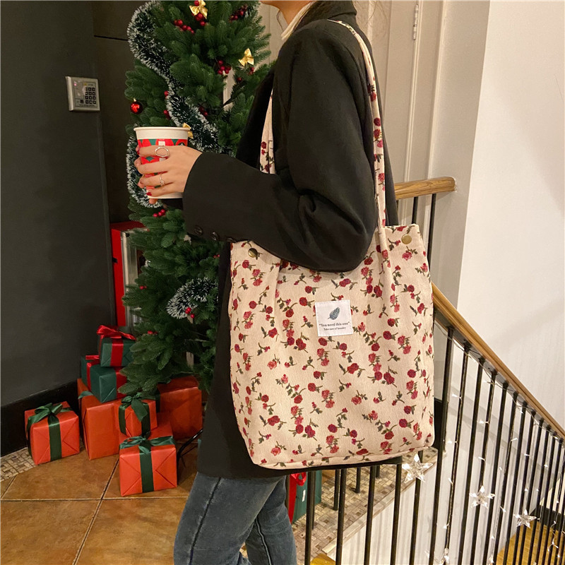 012174 Wholesale Korean-style corduroy four-button women's bags, large-capacity artistic single-shoulder bags, student shopping bags for women Application Scenario