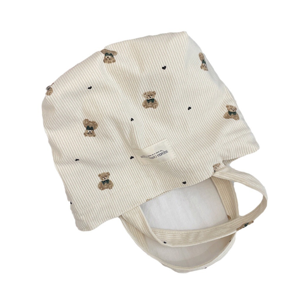 49121 copyright corduroy bear handbag, a handbag for women to carry out, a bento bag, and a small student lunch box bag Item Picture