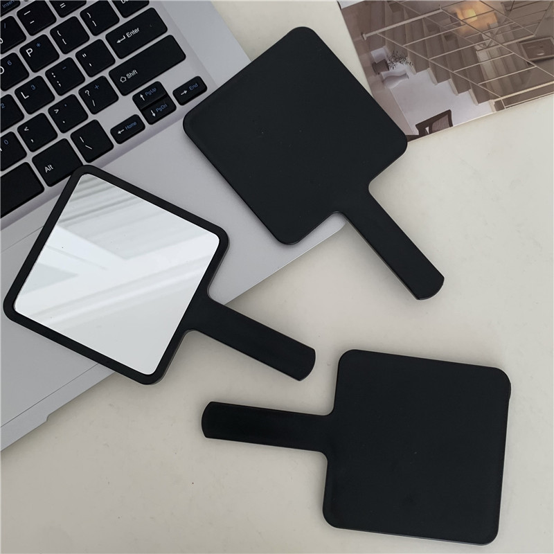ins simple solid-color handle mirror, portable makeup mirror, high appearance level, handheld touch-up mirror, small hand-held mirror Application Scenario
