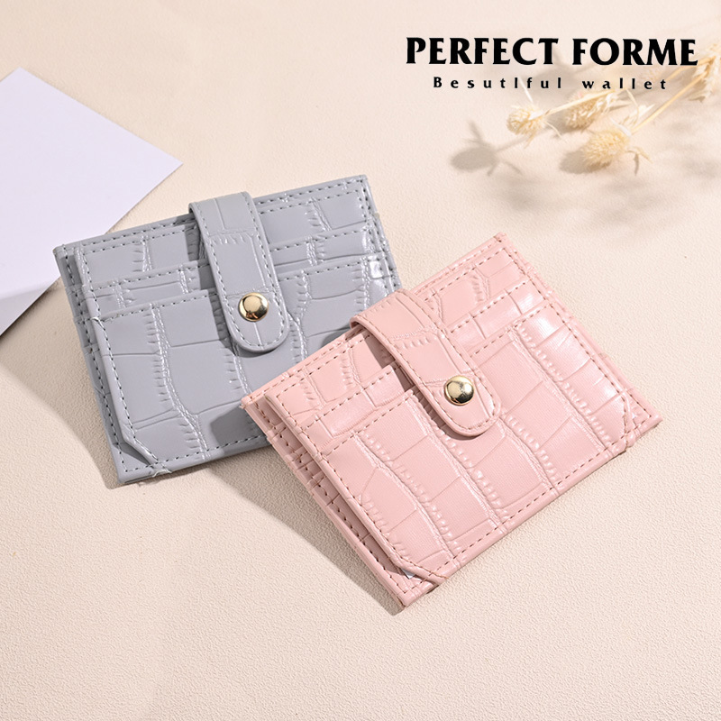 The new multi-slot mini coin purse, made of pu leather with stone texture, is a small, exquisite and ultra-thin card holder in an ins style Application Scenario