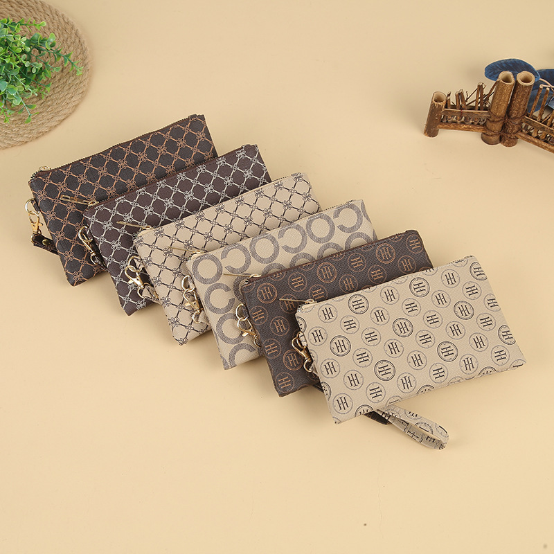 Wholesale of new wallet, casual long zipper women's clutch, multi-functional large capacity, waterproof and personalized small bags full figure