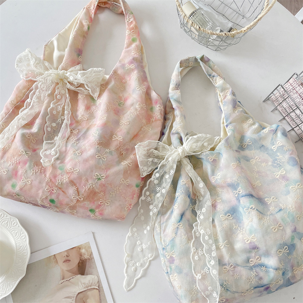 55302, a high-appearancy-level Korean-style faux bow, gentle and niche handbag, stylish single-shoulder underarm bag, tote bag details Picture