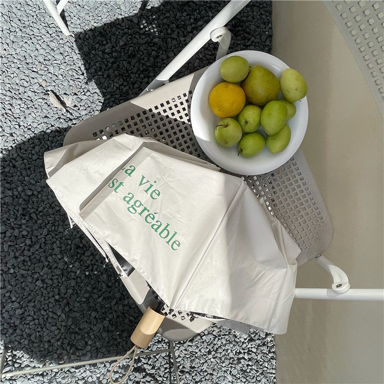 Original and homemade French umbrella. I love rainy days. It's a portable sun umbrella with black vinyl and UV protection Item Picture