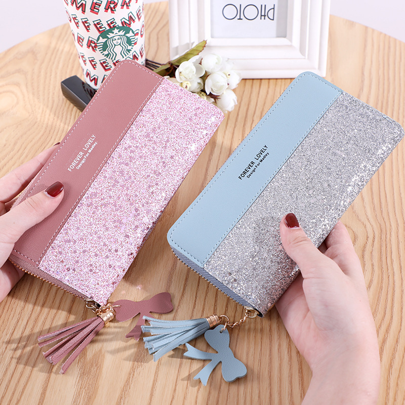 2020 new wallet long women's zipper money clip female Korean version splicing collision color tassel everything card bag mobile phone bag full figure