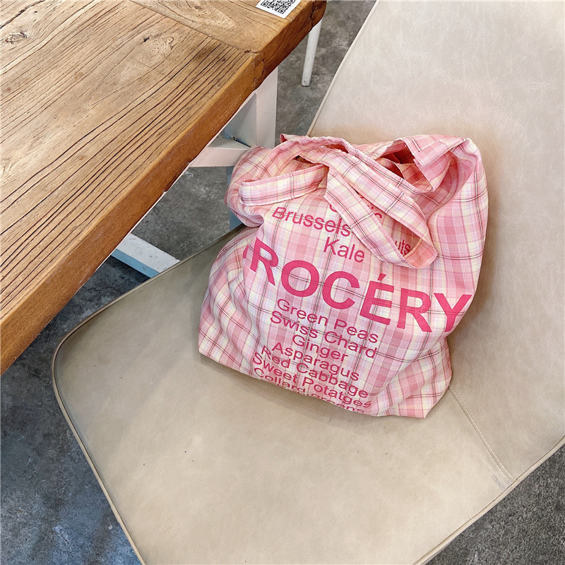 13231 canvas bag, a sweet Korean girl's checkered single-shoulder bag, a student's ins style portable shopping bag, a trend details Picture