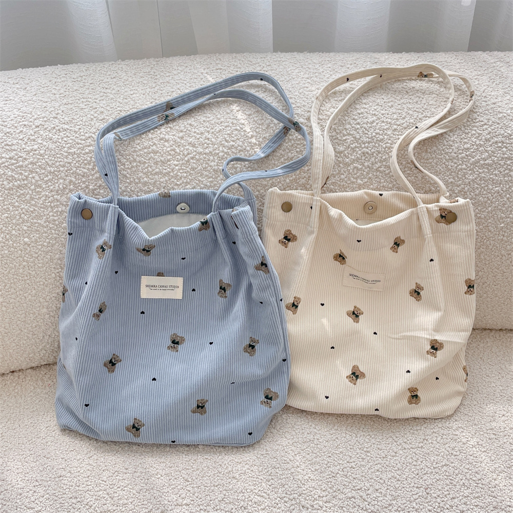 49193 copyrighted corduroy cartoon printed bear large capacity hand-held shoulder bag, student class armpit bag details Picture