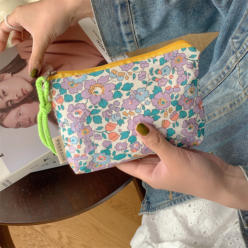 33262 Flower hand-held colorful rope bag, simple Japanese-style portable storage bag, portable toiletry and makeup bag, small storage bag Application Scenario
