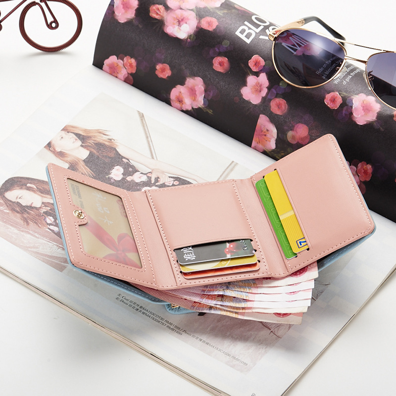 Factory direct sales 2021 New style women's wallet with Korean buckle, large capacity soft surface hand-held women's loose change card case Item Picture