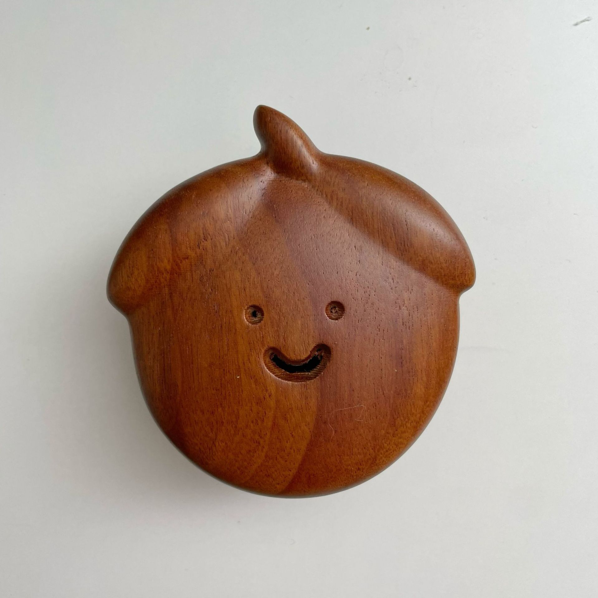 Cute smiling face sandalwood comb for women, portable airbag cushion for hair combing, skin meridian massage comb, mini round comb Item Picture