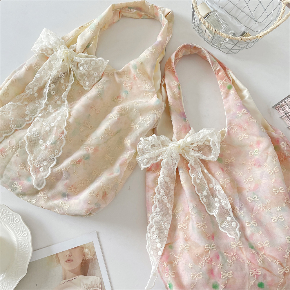 55302, a high-appearancy-level Korean-style faux bow, gentle and niche handbag, stylish single-shoulder underarm bag, tote bag full figure