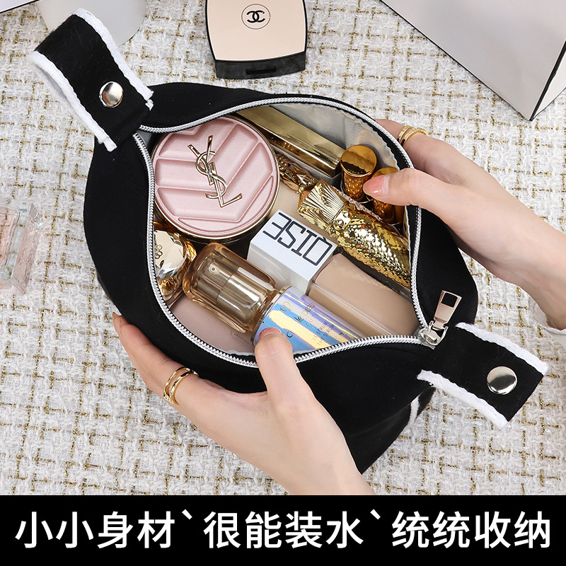 New high-end camellia portable lipstick, mobile phone, watch, key, canvas hand-held makeup bag, travel storage bag Specification drawing