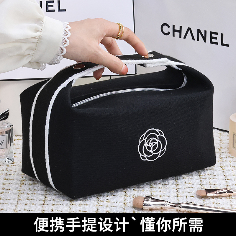 New high-end camellia portable lipstick, mobile phone, watch, key, canvas hand-held makeup bag, travel storage bag Application Scenario