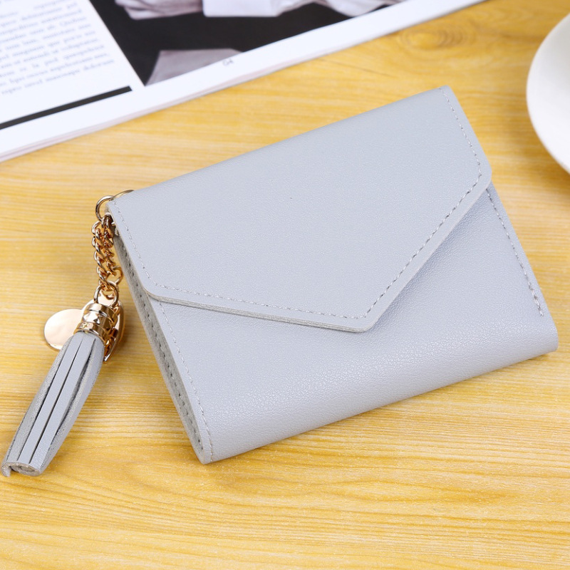 Factory direct sales of new women's short fringed multi-slot fashionable wallet wallet in stock Application Scenario