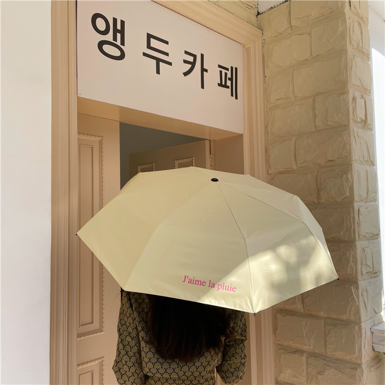 Original and homemade French umbrella. I love rainy days. It's a portable sun umbrella with black vinyl and UV protection full figure