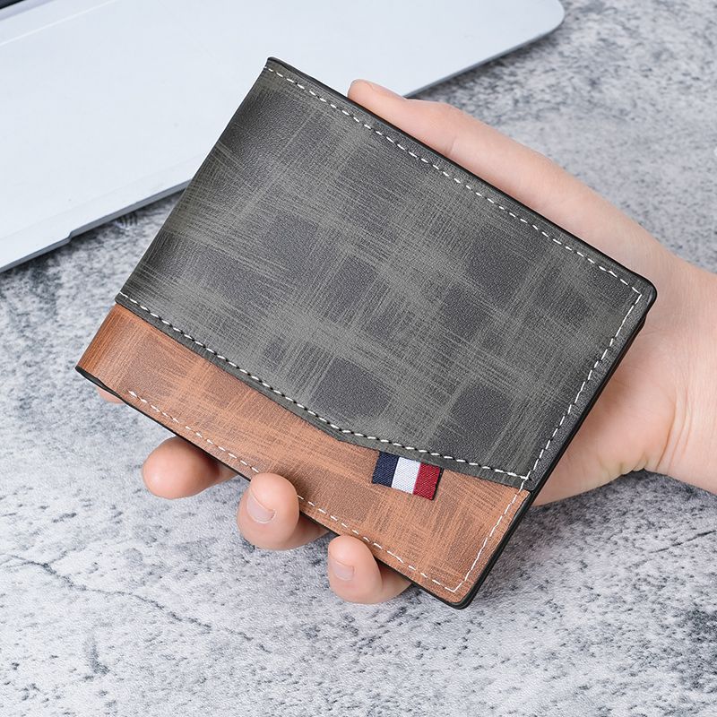The new men's wallet with spliced hinges is a short and stylish two-in-one frosted multi-slot large-capacity wallet with multiple layers full figure
