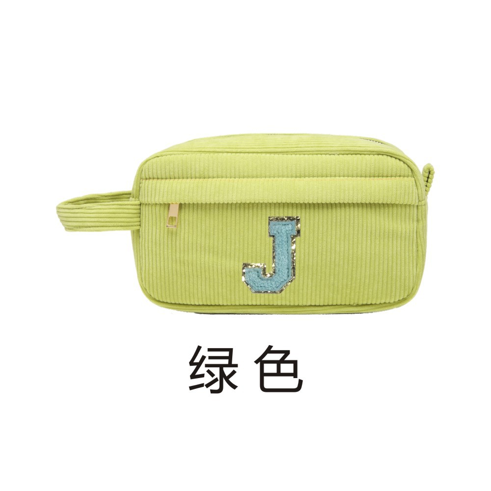 In-stock letter corduroy cosmetic bag, fashionable and simple mini portable cosmetics lipstick hand-held storage bag Application Scenario