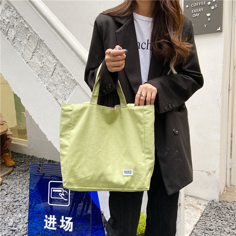 Wholesale of 12254 Japanese and Korean style double-bread simple checkered single-shoulder bag for student girls and casual dual-purpose canvas bag Item Picture